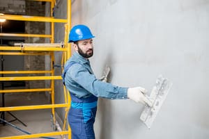 plasterer working indoors 2023 11 27 04 54 21 utc 1